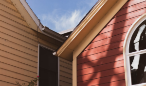 sides of homes with siding and gutters